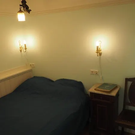 Bureau Warmoesstraat Bed & Breakfast Den Burg